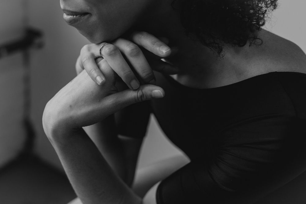 close up of dancer holding her hands together